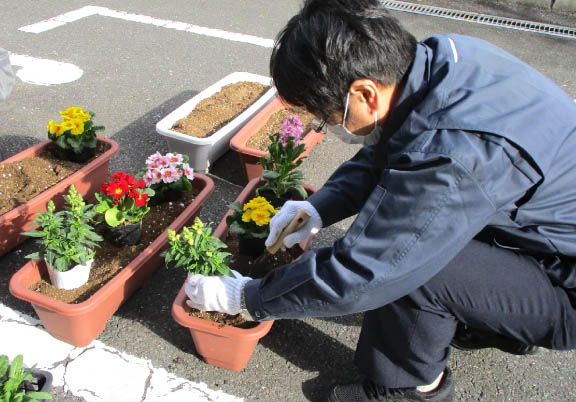 We plant flowers at each business site
